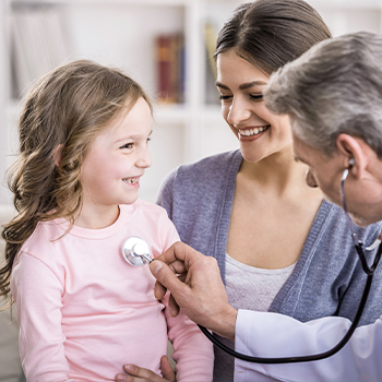 Image of our GP treating a patient in our Brisbane centre